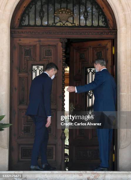 King Felipe VI of Spain receives Prime Minister Pedro Sanchez at the Marivent Palace on August 03, 2021 in Palma de Mallorca, Spain.