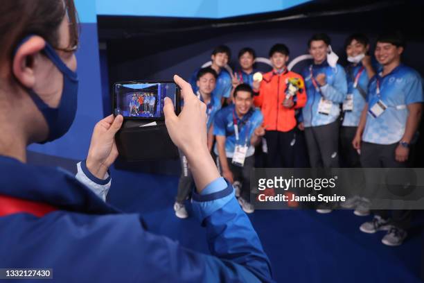 Daiki Hashimoto of Team Japan poses with the gold medal following the Men's Horizontal Bar Final on day eleven of the Tokyo 2020 Olympic Games at...