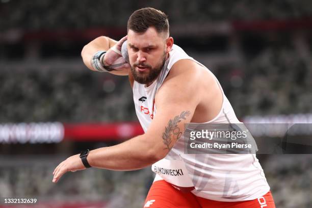 Konrad Bukowiecki of Team Poland competes in the Men's Shot Put qualification on day eleven of the Tokyo 2020 Olympic Games at Olympic Stadium on...