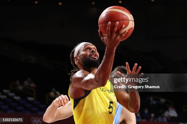 Patty Mills of Team Australia drives to the basket against Team Argentina during the first half of a Men's Basketball Quarterfinal game on day eleven...