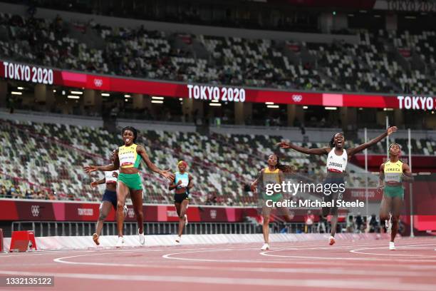 Elaine Thompson-Herah of Team Jamaica celebrates winning the gold medal as she crosses the finish line in the Women's 200m Final on day eleven of the...