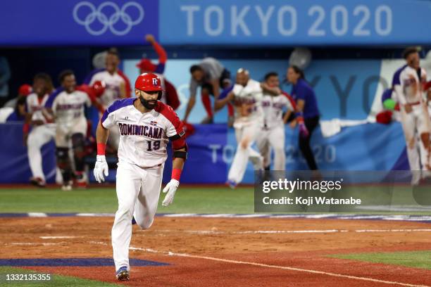 Jose Bautista of Team Dominican Republic hits a game-winning RBI single in the ninth inning to defeat Team Israel 7-6 during the knockout stage of...