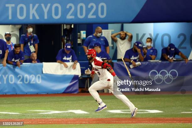 Jose Bautista of Team Dominican Republic hits a game-winning RBI single in the ninth inning to defeat Team Israel 7-6 during the knockout stage of...