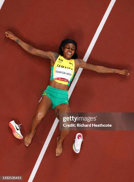 Elaine Thompson-Herah of Team Jamaica reacts after winning the gold medal in the Women's 200m Final on day eleven of the Tokyo 2020 Olympic Games at...