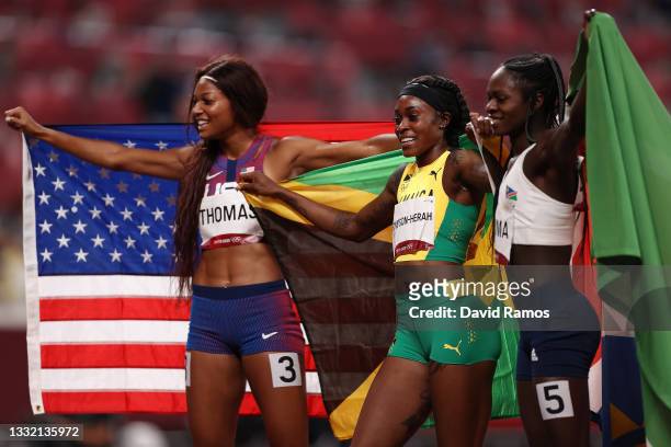 Bronze medal winner Gabrielle Thomas of Team United States, gold medal winner Elaine Thompson-Herah of Team Jamaica and silver medal winner Christine...