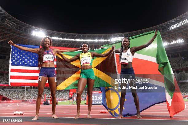 Bronze medal winner Gabrielle Thomas of Team United States, gold medal winner Elaine Thompson-Herah of Team Jamaica and silver medal winner Christine...