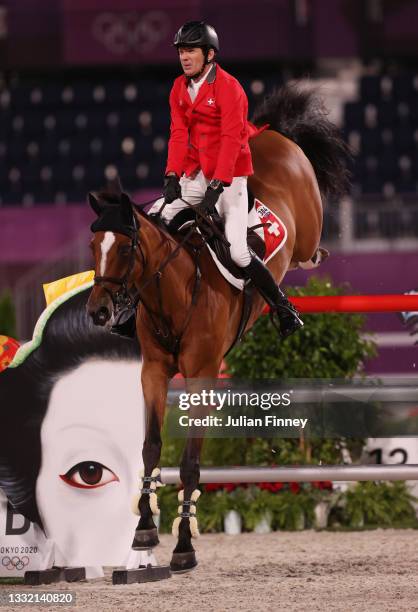 Beat Madli of Team Switzerland riding Dsarie competes during the Jumping Individual Qualifier on day eleven of the Tokyo 2020 Olympic Games at...