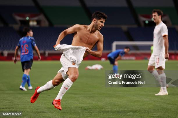 Marco Asensio of Team Spain celebrates after scoring their side's first goal during the Men's Football Semi-final match between Japan and Spain on...