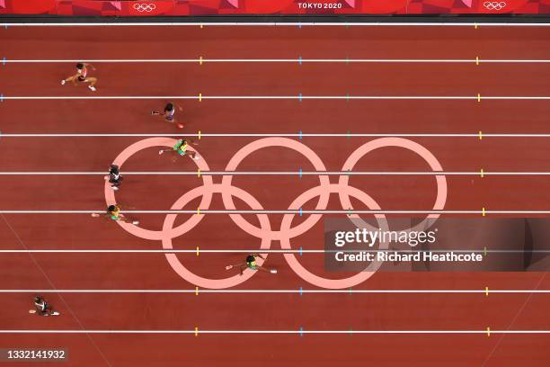 Elaine Thompson-Herah of Team Jamaica leads the field to win the gold medal in the Women's 200m Final on day eleven of the Tokyo 2020 Olympic Games...