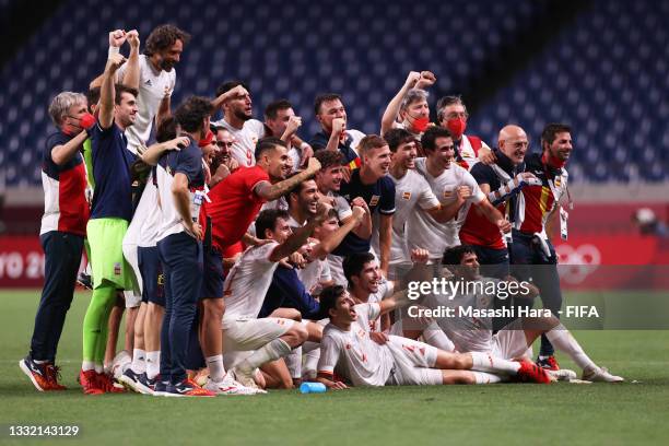 Players of Team Spain celebrate after victory in the Men's Football Semi-final match between Japan and Spain on day eleven of the Tokyo 2020 Olympic...