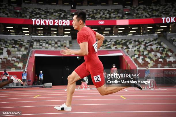 Zhenye Xie of Team China competes in the Men's 200m Semi-Final on day eleven of the Tokyo 2020 Olympic Games at Olympic Stadium on August 03, 2021 in...