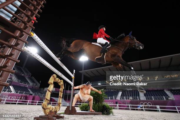 Jessica Springsteen of Team United States riding Don Juan Van De Donkhoeve competes during the Jumping Individual Qualifier on day eleven of the...