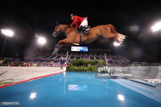 Daisuke Fukushima of Team Japan riding Chanyon competes during the Jumping Individual Qualifier on day eleven of the Tokyo 2020 Olympic Games at...