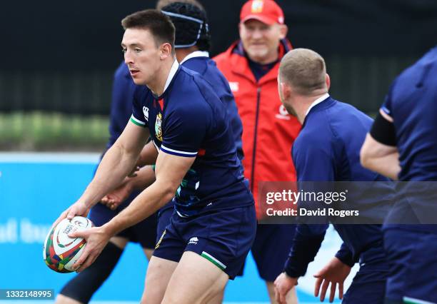 Josh Adams of British & Irish Lions passes the ball during a training session at Hermanus High School on August 03, 2021 in Hermanus, South Africa.