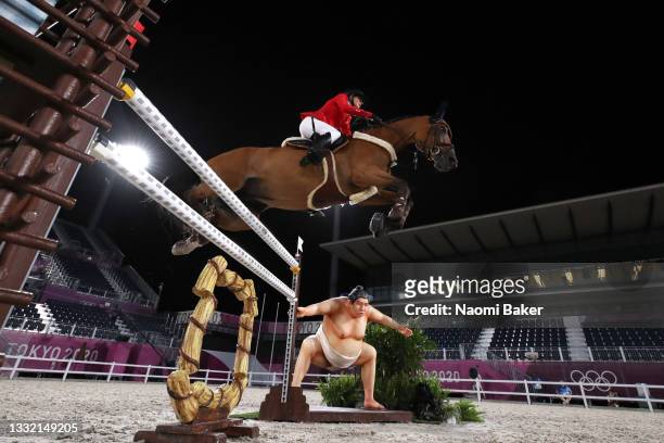 Jessica Springsteen of Team United States riding Don Juan Van De Donkhoeve competes during the Jumping Individual Qualifier on day eleven of the...