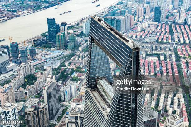 aerial view of shanghai cityscape - shanghai world financial center stock pictures, royalty-free photos & images