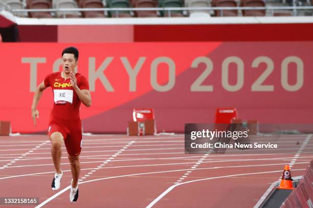 Zhenye Xie of Team China competes in the Men's 200m Semi-Final on day eleven of the Tokyo 2020 Olympic Games at Olympic Stadium on August 03, 2021 in...