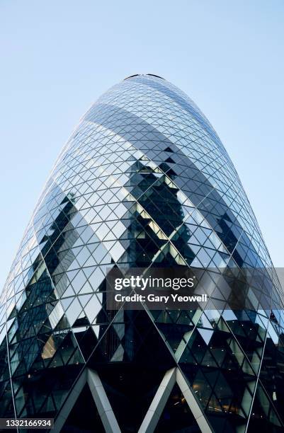 low angle view of gherkin skyscraper in london - swiss building stock pictures, royalty-free photos & images