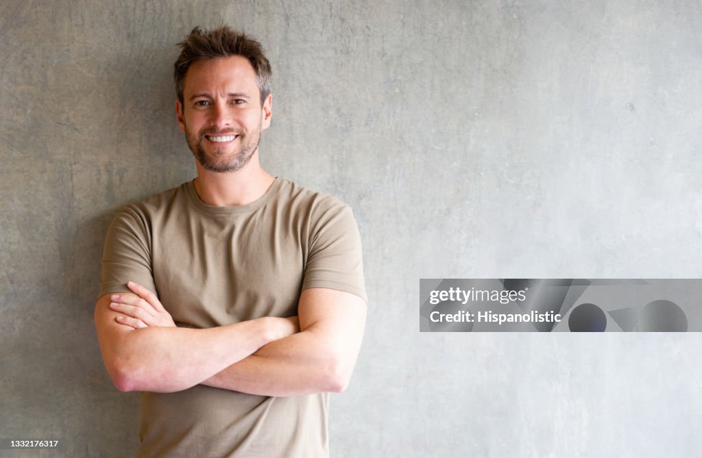 Happy Latin American man looking at the camera smiling