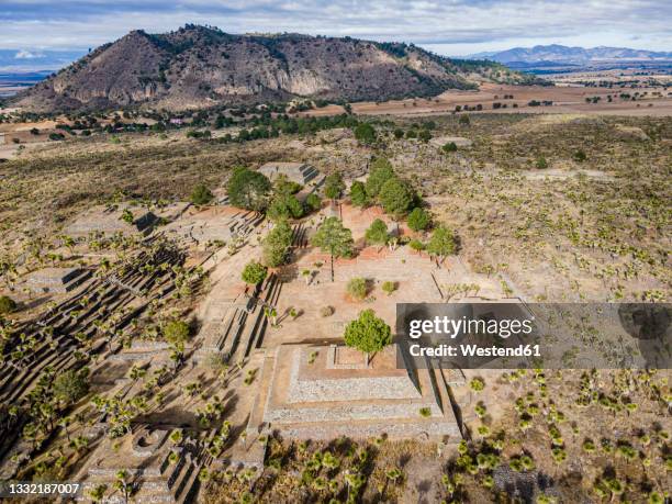 aerial view of old ruins and mountain, puebla, mexico - cantona stock pictures, royalty-free photos & images