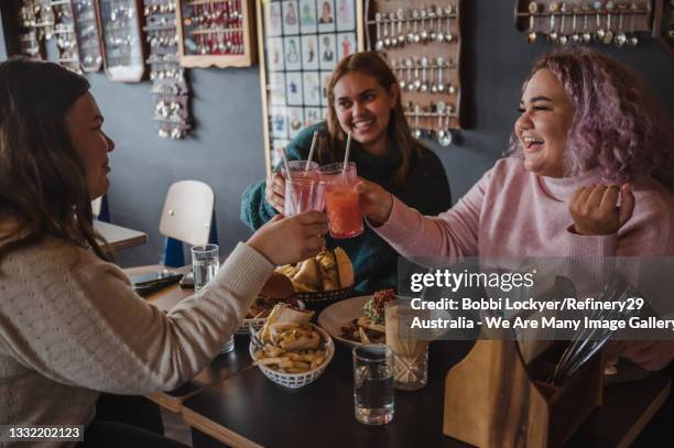 young friends socialising - brunch stock-fotos und bilder