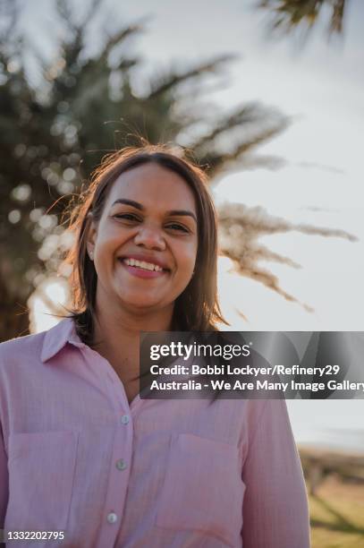 smiling portrait of a young woman - australia women stockfoto's en -beelden