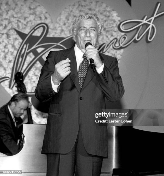 American singer of traditional pop standards, big band, show tunes, and jazz Tony Bennett sings during the 1995 MusiCares Person Of The Year Gala...