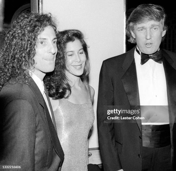 American smooth jazz saxophonist Kenny G, girlfriend Lyndie Benson and American media personality, businessman, and politician who served as the 45th...