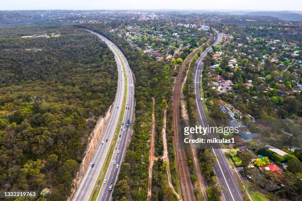 m1 pacific motorway, highway sydney - aerial train stock pictures, royalty-free photos & images