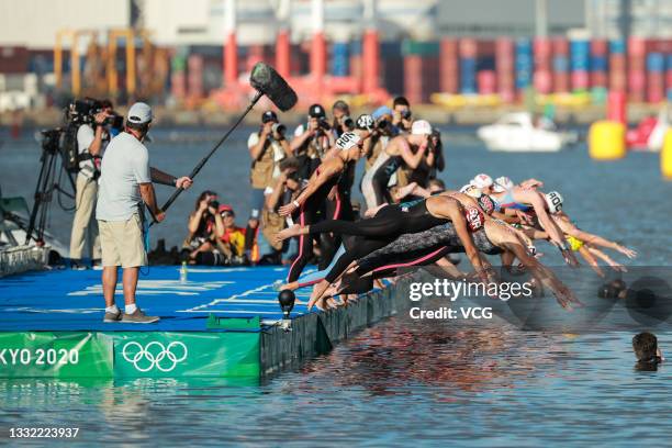 Swimmers compete in the Women's 10 km Marathon Swimming on day twelve of the Tokyo 2020 Olympic Games at Odaiba Marine Park on August 04, 2021 in...