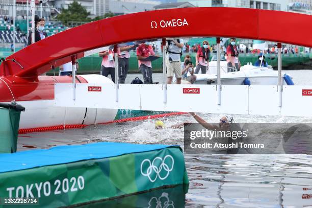 Sharon van Rouwendaal of Team Netherlands finishes second and wins a silver medal in the Women's 10km Marathon Swimming on day twelve of the Tokyo...