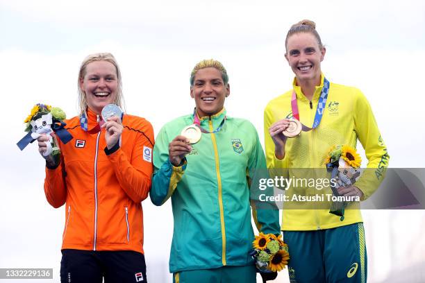 Silver medalist Sharon van Rouwendaal of Team Netherlands, Gold medalist Ana Marcela Cunha of Team Brazil, and Bronze medalist Kareena Lee of Team...