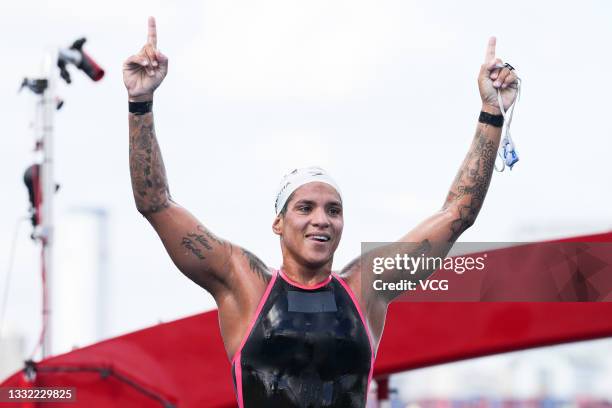 Ana Marcela Cunha of Brazil celebrates after winning the Women's 10 km Marathon Swimming on day twelve of the Tokyo 2020 Olympic Games at Odaiba...