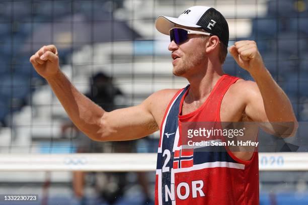 Christian Sandlie Sorum of Team Norway celebrates after defeating Team ROC during the Men's Quarterfinal beach volleyball on day twelve of the Tokyo...