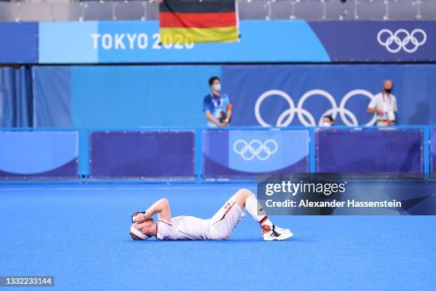 Jan Christopher Rühr of Team Germany reacts following a loss in the Men's Semifinal match between Australia and Germany on day eleven of the Tokyo...