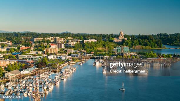 drone shot of olympia, washington at sunset - staat washington stockfoto's en -beelden