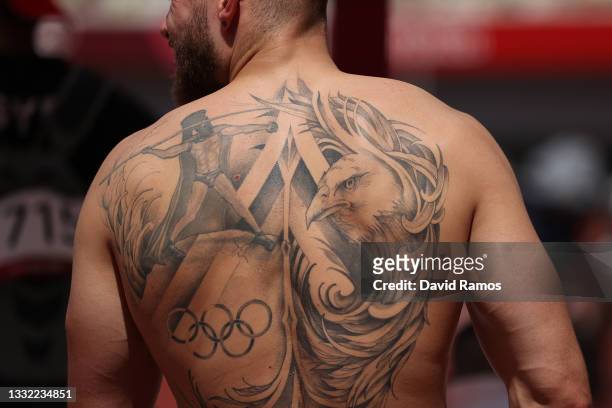View of the tattoo on the back of Johannes Vetter of Team Germany during the Men's Javelin Throw Qualification on day twelve of the Tokyo 2020...