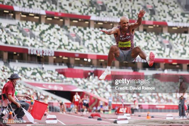 Damian Warner of Team Canada competes in the Men's Decathlon Long Jump on day twelve of the Tokyo 2020 Olympic Games at Olympic Stadium on August 04,...