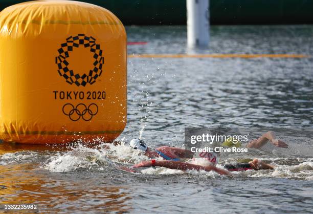 Swimmers compete in the Women's 10km Marathon Swimming on day twelve of the Tokyo 2020 Olympic Games at Odaiba Marine Park on August 04, 2021 in...
