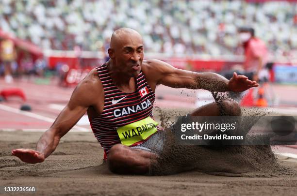 Damian Warner of Team Canada competes in the Men's Decathlon Long Jump on day twelve of the Tokyo 2020 Olympic Games at Olympic Stadium on August 04,...