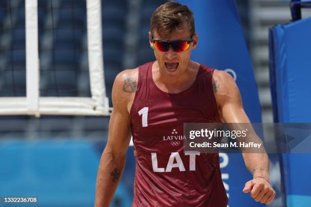 Martins Plavins of Team Latvia reacts after the play against Team Brazil during the Men's Quarterfinal beach volleyball on day twelve of the Tokyo...