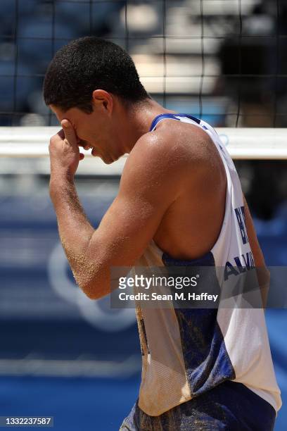 Alvaro Morais Filho of Team Brazil reacts after losing to Team Latvia during the Men's Quarterfinal beach volleyball on day twelve of the Tokyo 2020...