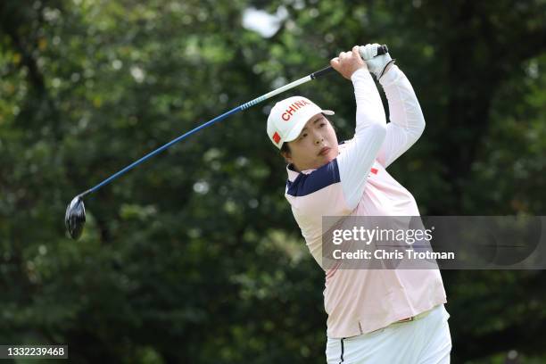 Shanshan Feng of Team China plays her shot from the eighth tee during the first round of the Women's Individual Stroke Play on day twelve of the...