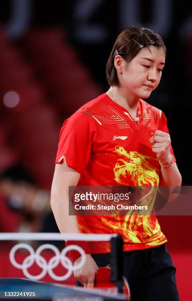 Chen Meng of Team China reacts during her Women's Team Semifinal table tennis match on day twelve of the Tokyo 2020 Olympic Games at Tokyo...