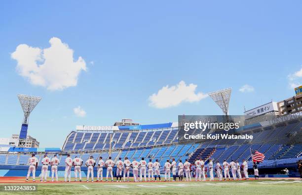 Team United States stand on the base line for pregame ceremonies before the game against Team Dominican Republic during the knockout stage of men's...