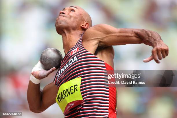 Damian Warner of Team Canada competes in the Men's Decathlon Shot Put on day twelve of the Tokyo 2020 Olympic Games at Olympic Stadium on August 04,...