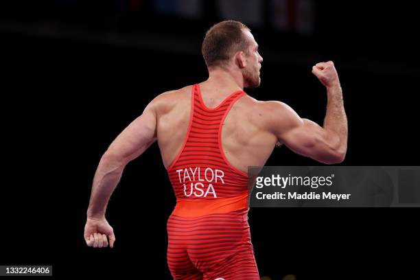 David Morris Taylor III of Team United States celebrates defeating Ali Shabanau of Team Belarus during the Men's Freestyle 86kg 1/8 Final on day...