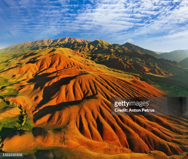 aerial view of mountain landscape in kyrgyzstan at sunset. - central asia stock pictures, royalty-free photos & images