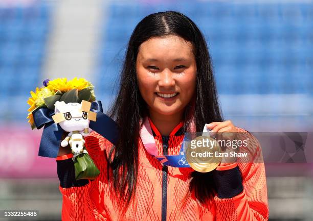 Sakura Yosozumi of Team Japan poses with her Gold medal after the Women's Skateboarding Park Finals on day twelve of the Tokyo 2020 Olympic Games at...