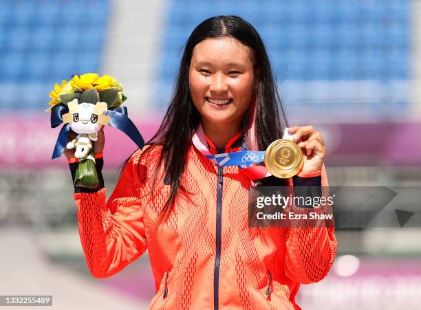 Sakura Yosozumi of Team Japan poses with her Gold medal after the Women's Skateboarding Park Finals on day twelve of the Tokyo 2020 Olympic Games at...